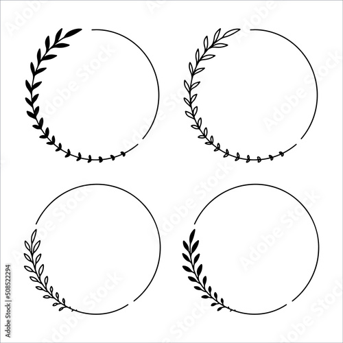 Set of 4 hand drawn spring wreaths isolated on white background, vector. Outline frames of leaves. Doodle style.Collection of floral monogram frames.