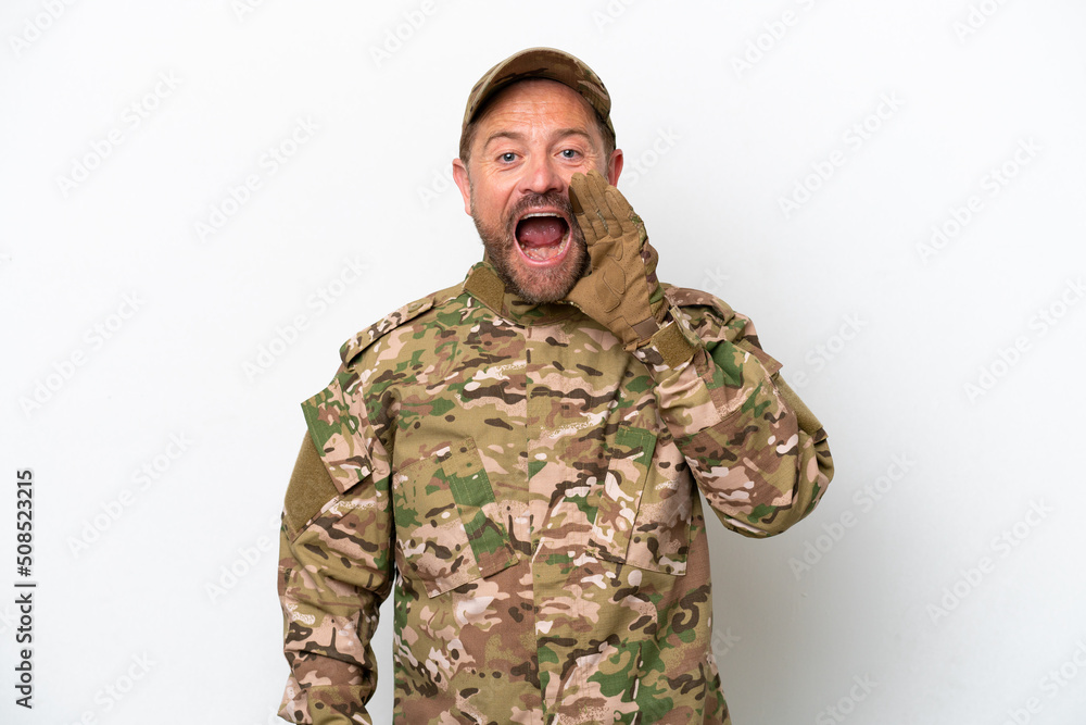 Military man isolated on white background with surprise and shocked facial expression Military man isolated on white background with surprise and shocked facial expression