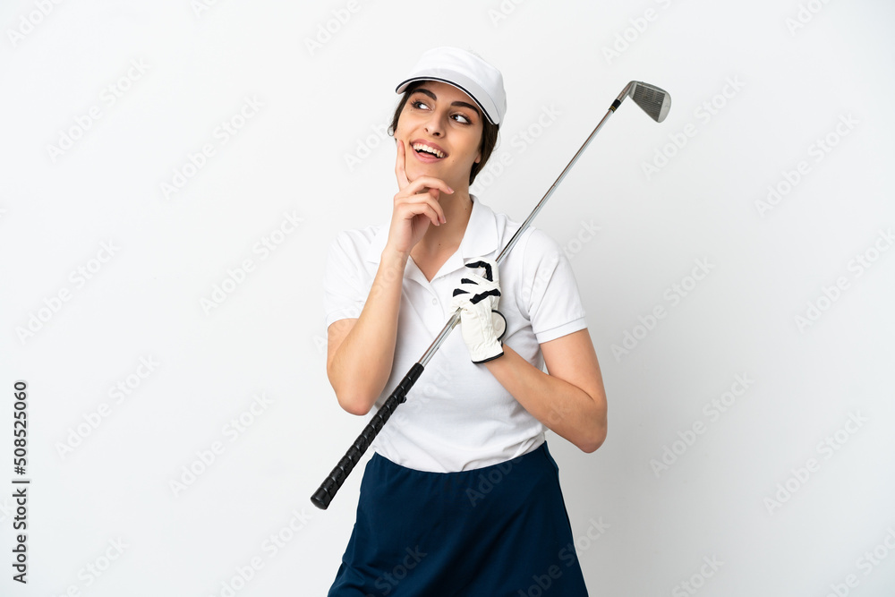 Handsome young golfer player woman isolated on white background thinking an idea while looking up Handsome young golfer player woman isolated on white background thinking an idea while looking up