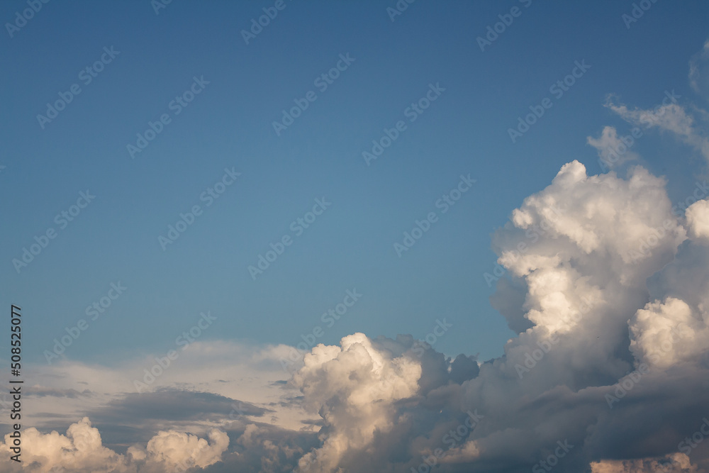Blue sky with beautiful white clouds at sunny day, natural background, copy space Blue sky with beautiful white clouds at sunny day, natural background, copy space