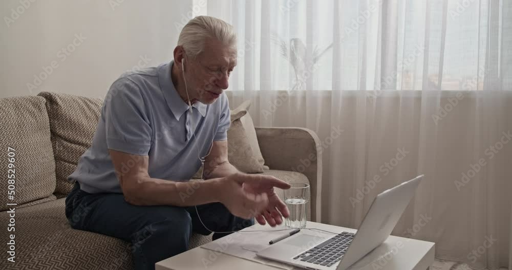 Senior man making video call to relatives Senior man making video call to relatives