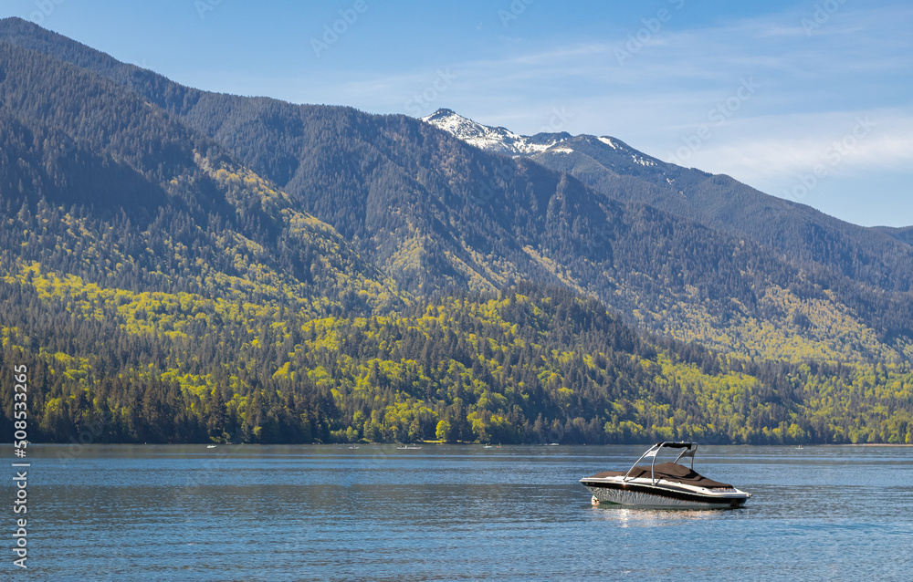 Landscape of a beautiful mountain lake and boat