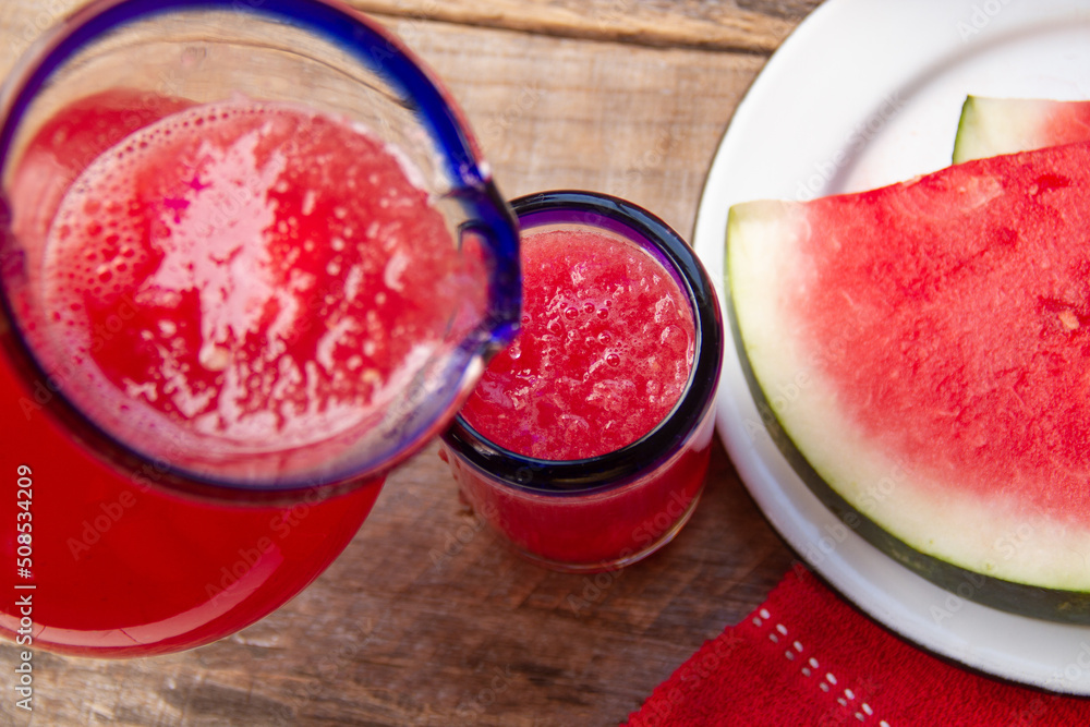 Watermelon water in glass jar Watermelon water in glass jar