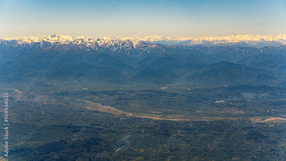 panorama of beautiful green valley and snowy mountains. High quality photo panorama of beautiful green valley and snowy mountains. High quality photo