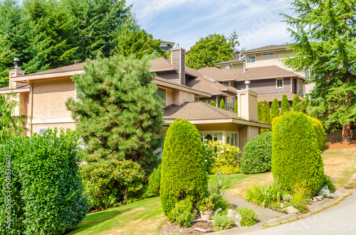 Houses in suburb at Summer in the north America. Luxury houses with nice landscape. © karamysh