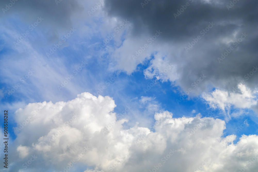 Nimbostratus clouds cover the bright blue sky. Worsening weather. Relationship deterioration concept Nimbostratus clouds cover the bright blue sky. Worsening weather. Relationship deterioration concept