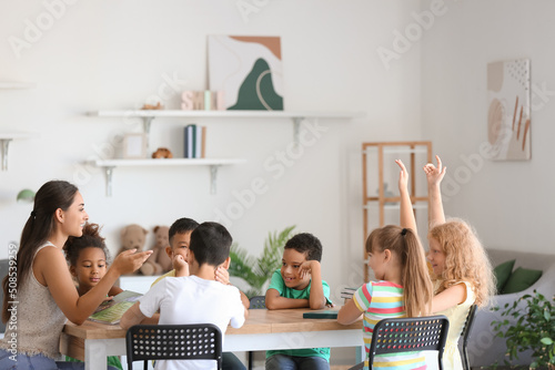 Little pupils having litera...