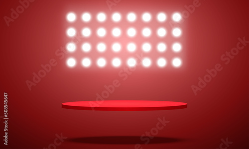 red podium with spotlightlight in the red room