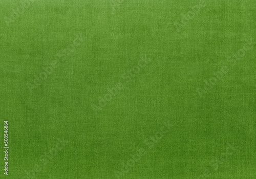 背景用の緑色の毛並みのある布のテクスチャ