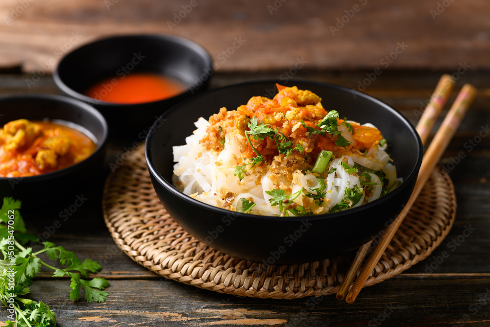 Rice noodle mixed with spicy tomatoes sauce, Tai Yai food in Northern of Thailand Rice noodle mixed with spicy tomatoes sauce, Tai Yai food in Northern of Thailand