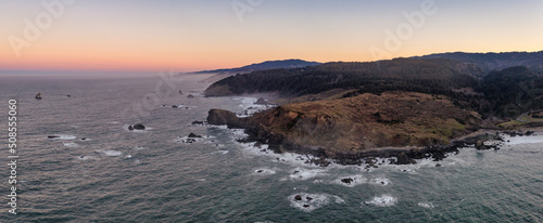 Cape Ferrelo in Brookings, Oregon. Aerial Panorama at sunrise.  photo