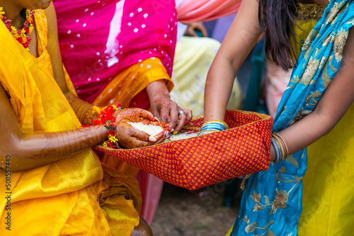 Indian Hindu pre wedding haldi turmeric ceremony close ups