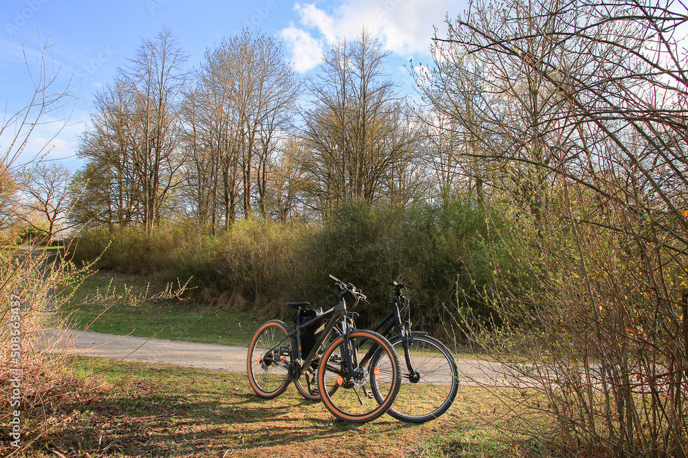 Regensburg, Germany: two bicycles parked on a rural road Regensburg, Germany: two bicycles parked on a rural road