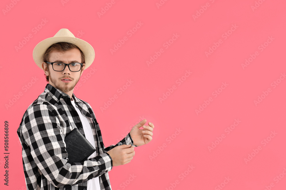 Concept of people, young man on pink background Concept of people, young man on pink background
