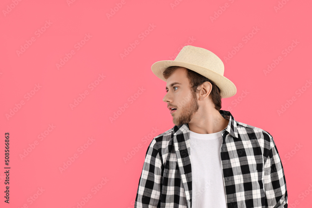 Concept of people, young man on pink background Concept of people, young man on pink background