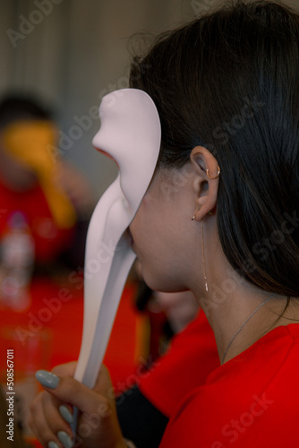 A person in a long nose venice mask photo