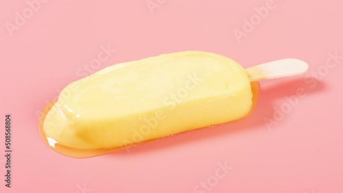 yellow popsicle melting timelapse on a pink background