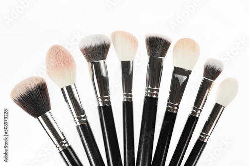 Professional makeup brush made of natural pile on a white background
