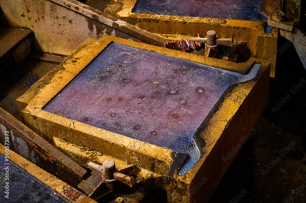Copper ingot in anode casting form in metal melting workshop