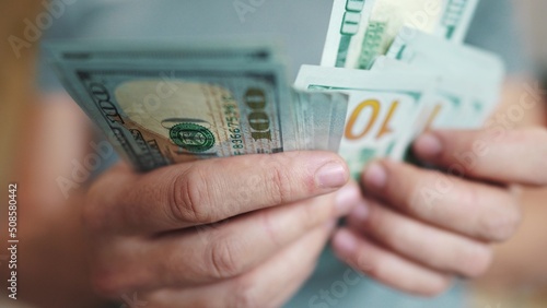 dollar money. bankrupt man counting money cash. business crisis finance dollar concept. close-up of a hand counting paper dollars. exchange finance economy dollar usd lifestyle