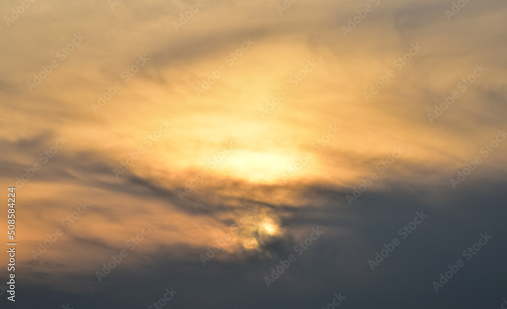Sunset sky behind clouds, Nature background