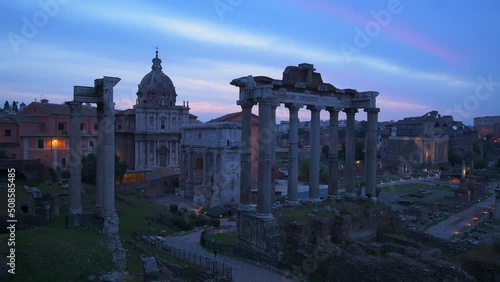 Timelapse of Roman Forum in Rome at sunrise , Lazio, Rome, Italy. photo