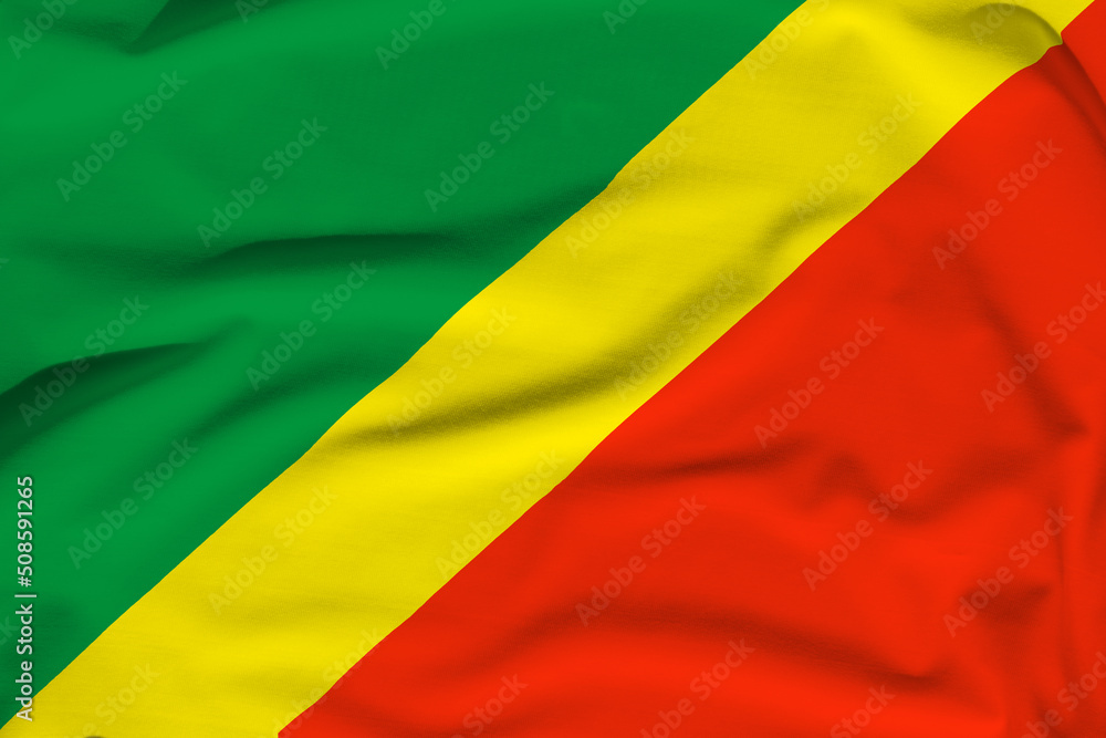 Republic of the Congo national flag, folds and hard shadows on the canvas Republic of the Congo national flag, folds and hard shadows on the canvas