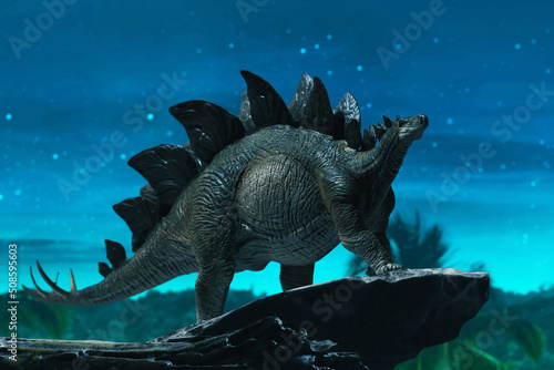 Dinosaur 3d rendering, Stegosaurus on top mountain © fotokitas