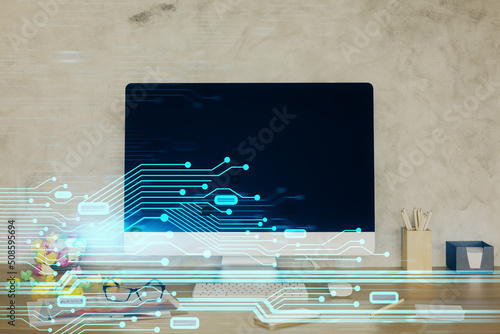 Double exposure of table with computer on background and data theme hologram. Data technology concept. © peshkova