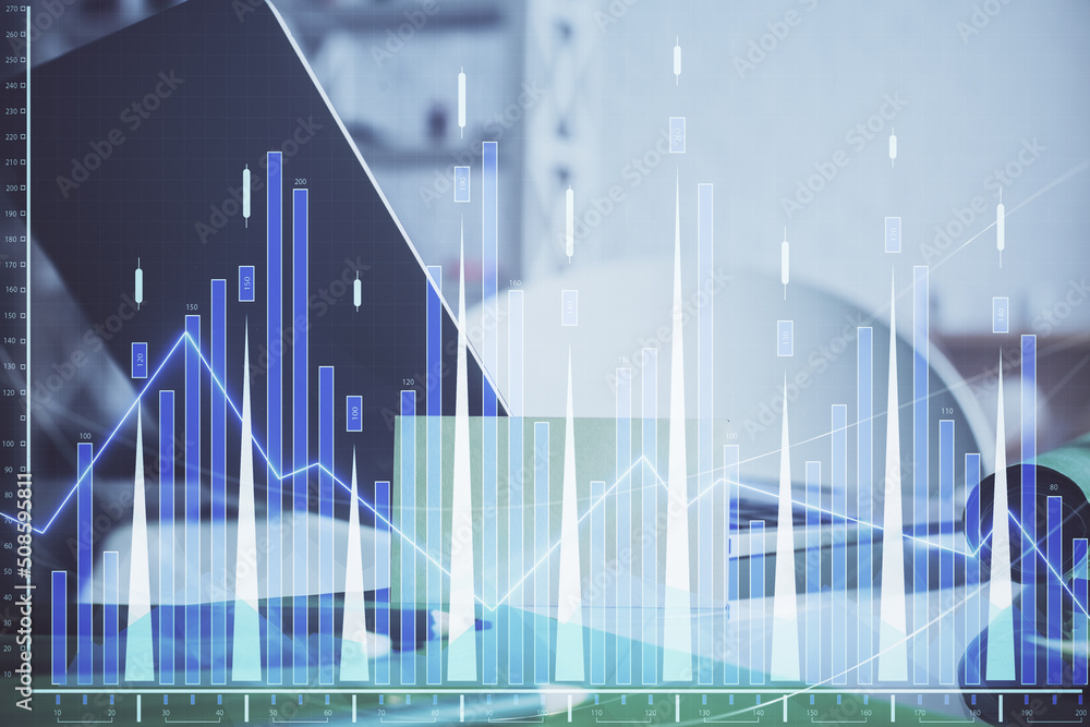 Forex market graph hologram and personal computer on background. Multi exposure. Concept of investment. Forex market graph hologram and personal computer on background. Multi exposure. Concept of investment.
