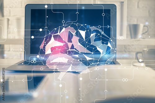 Double exposure of work table with computer and brain sketch hologram. Brainstorming concept.
