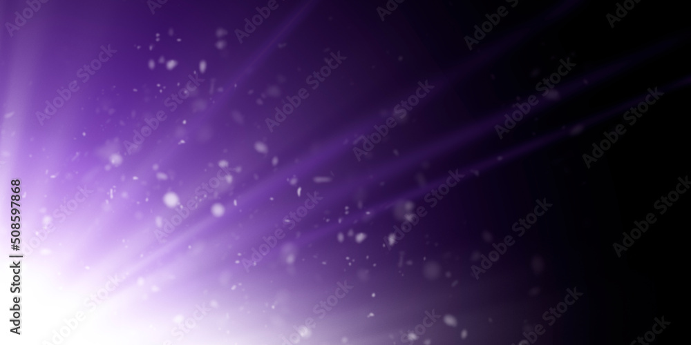 bright purple diffused light with dust particles on a black background