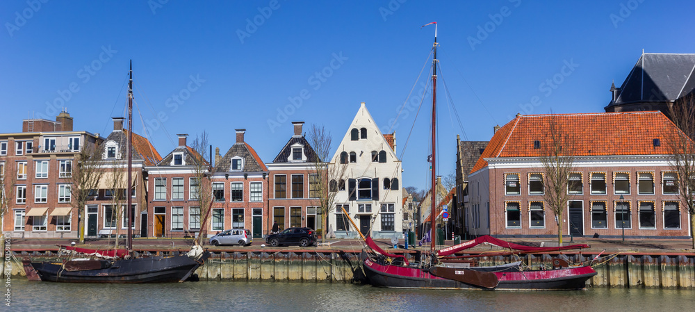Panorama of old wooden sailing ships in the Zuiderhaven harbor of Harlingen, Netherlands