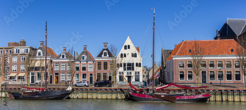 Panorama of old wooden sailing ships in the Zuiderhaven harbor of Harlingen, Netherlands