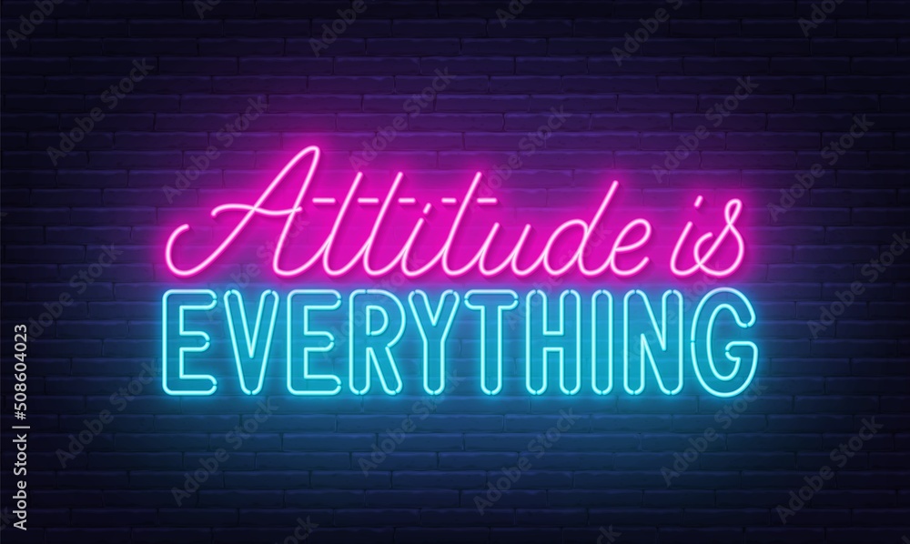 Attitude is everything neon quote on a brick wall. Attitude is everything neon quote on a brick wall.