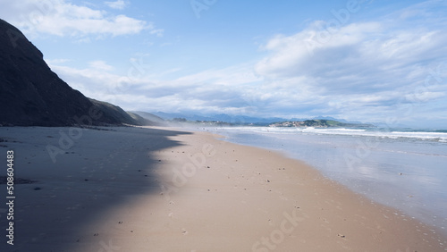 Ocean bay, ocean coastline with empty sandy beach