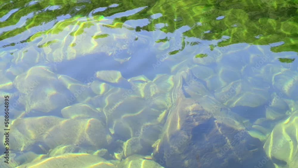 transparent, fresh, pure and clear light green water river with rocks at the bottom. Corsica, France, Europe transparent, fresh, pure and clear light green water river with rocks at the bottom. Corsica, France, Europe