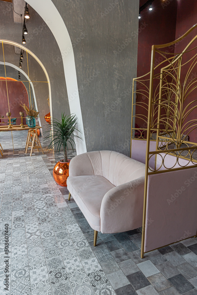 interior of a large apartment in oriental mixed with loft style with arches, led lighting and bright orange elements interior of a large apartment in oriental mixed with loft style with arches, led lighting and bright orange elements
