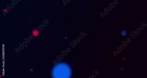 Image of red and blue dots moving on black background © vectorfusionart