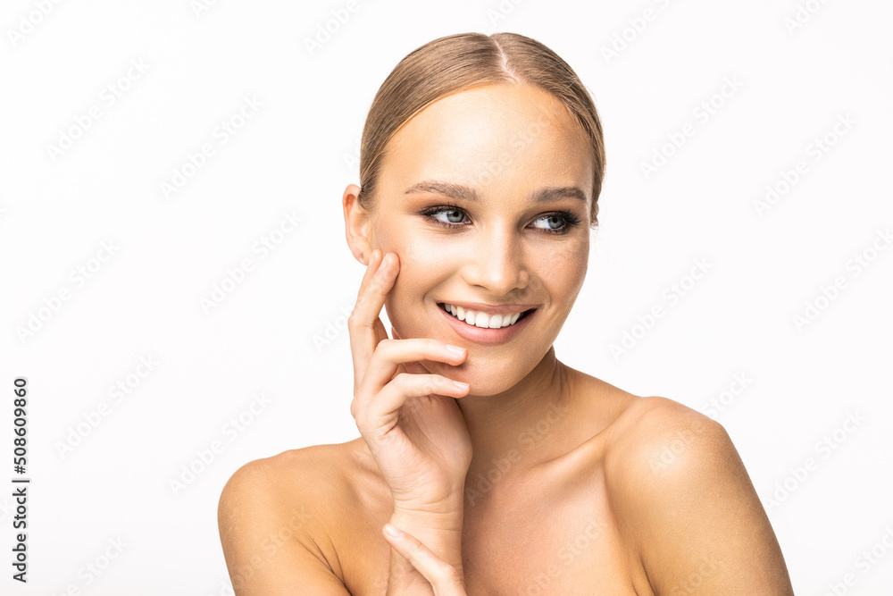 Beautiful young girl with a light natural make-up and perfect skin. Beauty face. on a white background.