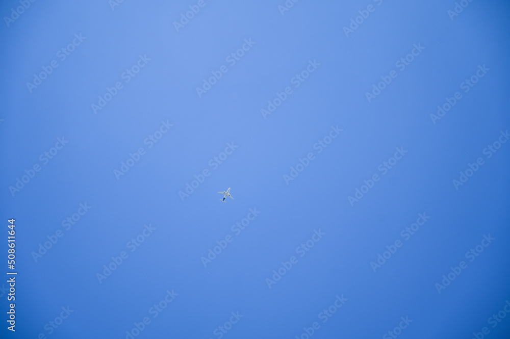 Airplane flying on the blue sky. Airplane flying on the blue sky.