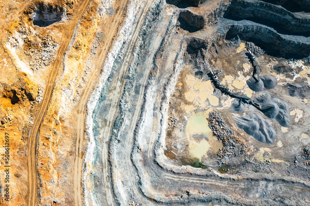 Dolomite Mine. Industrial Terraces. Aerial view of open pit mining. Excavation of the Dolomite Mine. Extractive industry. - obrazy, fototapety, plakaty 