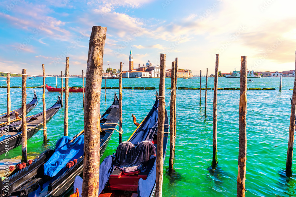 San Giorgio Maggiore Island and traditional Gondolas moored in the Grand Canal, Venice, Italy