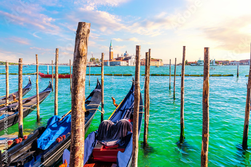 Obraz na płótnie San Giorgio Maggiore Island and traditional Gondolas moored in the Grand Canal, Venice, Italy w salonie