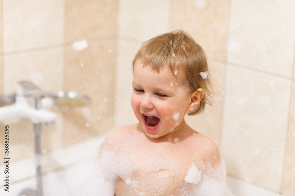 Cute 2 years girl play with foam in the bath Cute 2 years girl play with foam in the bath