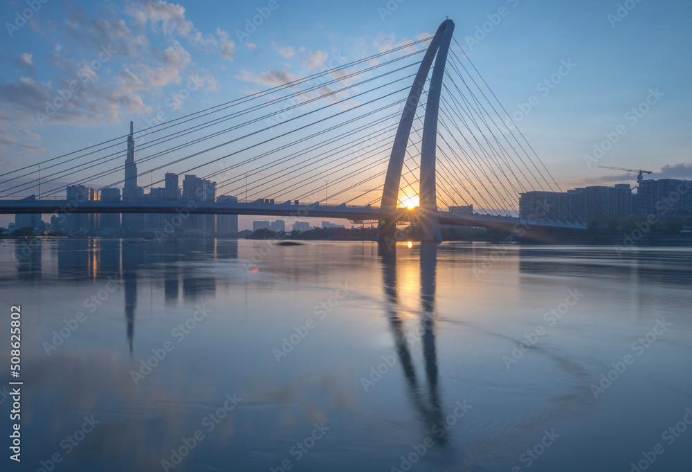 Landscape photo: Thu Thiem 2 bridge at dawn. Time: June 02, 2022. Location: Ho Chi Minh City. This is a new bridge inaugurated in May 2022. Bridge connecting District 2 and District 1 in Ho Chi Minh C