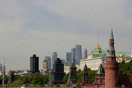 Kremlin towers against the backdrop of Moscow City skyscrapers.