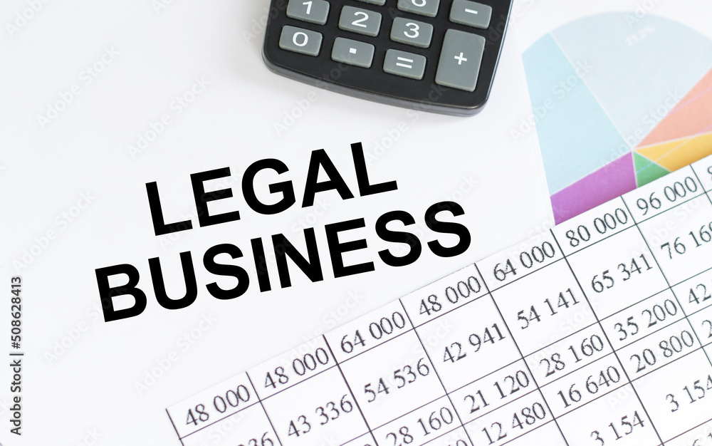 Legal business text on a notebook on the table, business concept Legal business text on a notebook on the table, business concept