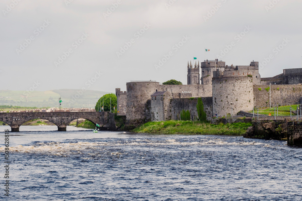 Stunning medieval King John castle on river Shannon, Limerick city, Ireland. Popular and famous tourist landmark.