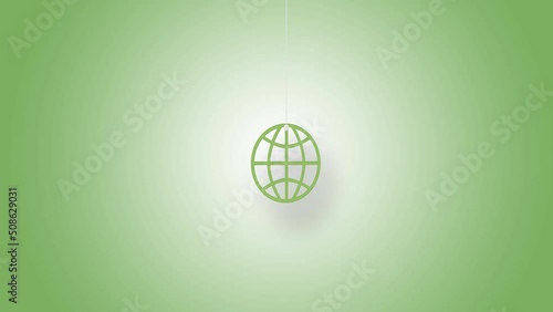 Globe symbol in green hanged with strings against green background. High quality video in 4K resolution.